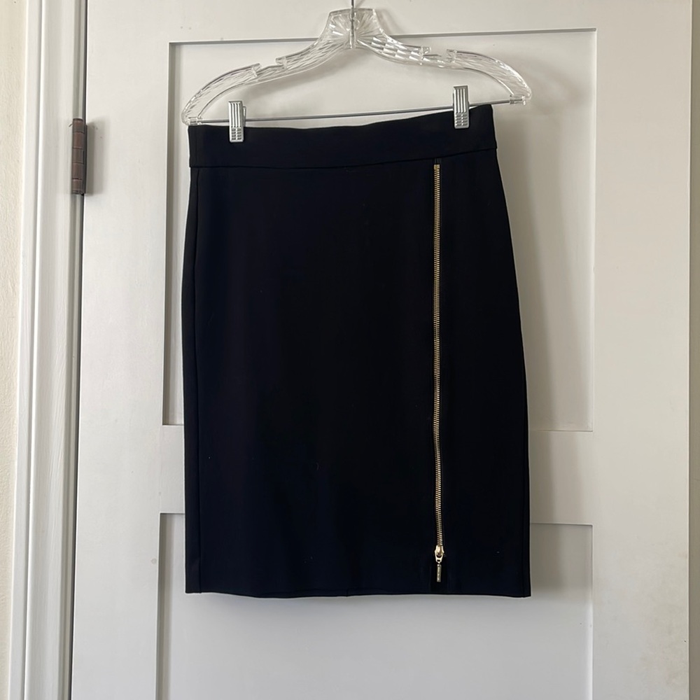Black midi skirt with gold zipper